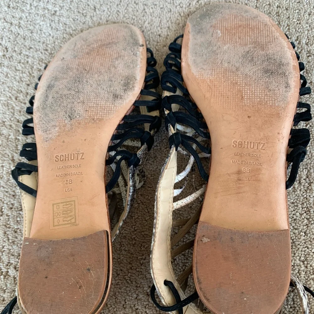 Schultz Snakeskin Print Gladiator Sandals with Black and Tan Details